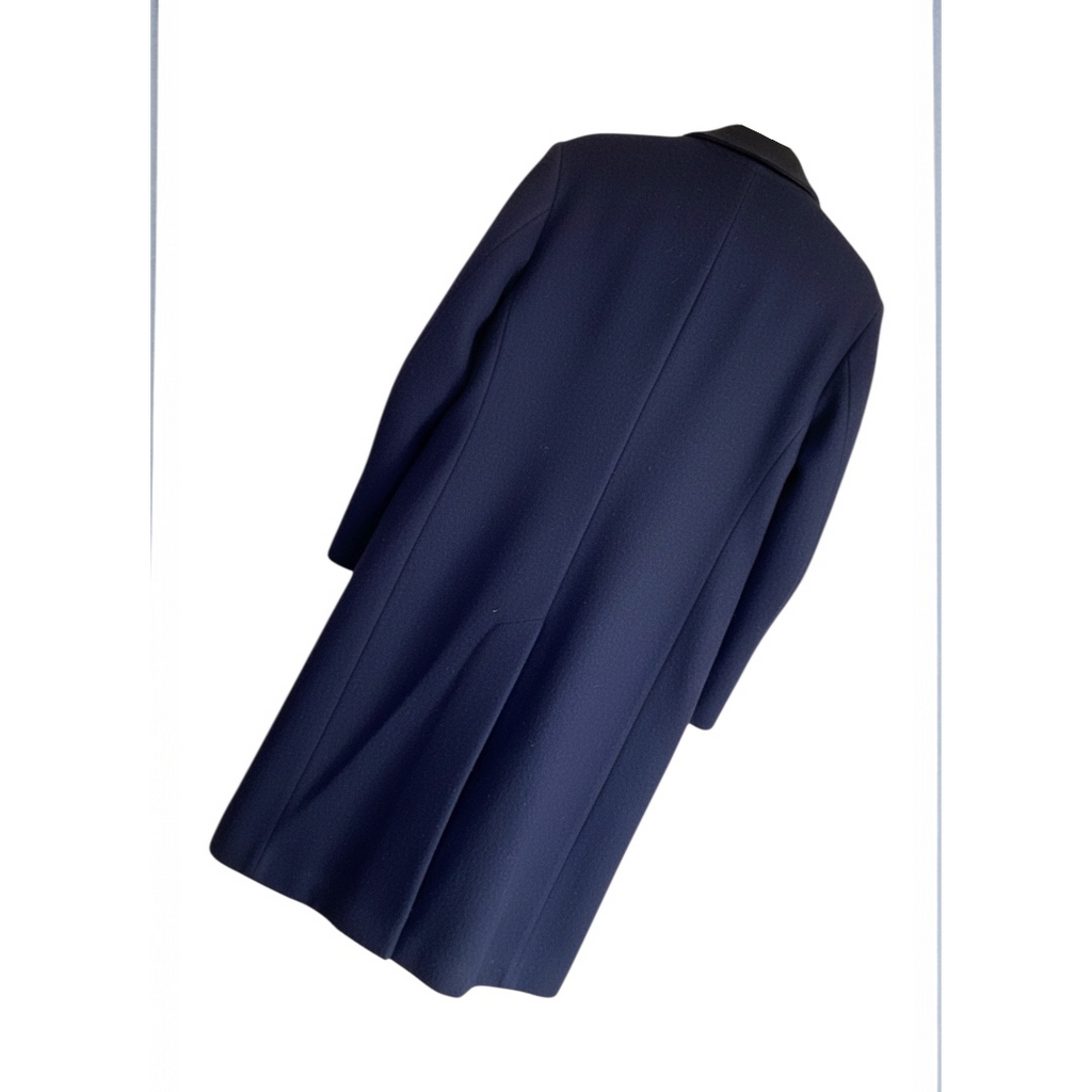 Oversized wool coat - The Hilton Company Inc.